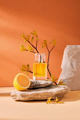 Minimal abstract cosmetic orange background for product presentation. stone, wood shape with lemon...
