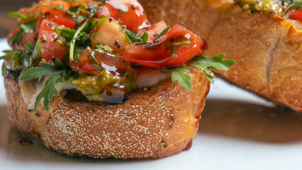 Close-up view of tomato and mozzarella bruschetta on white background. Healthy life concept.