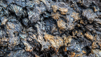 texture roche volcanique noire et orange