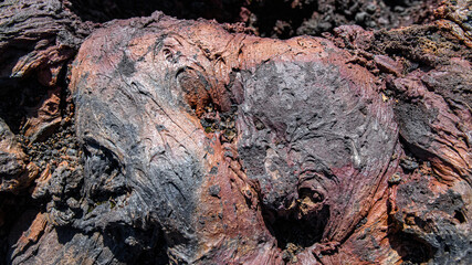 texture roche volcanique noire et rouge