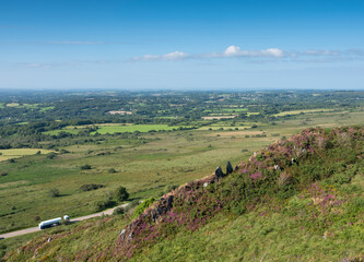 view over brittany from hill in parc naturel d'armorique under blue sky in summer