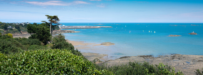 blue sky over sea and sailing boats in atlantic ocean near st brieuc in french brittany