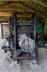 Fototapeta na wymiar view of a historic wood saw and mill for cutting logs