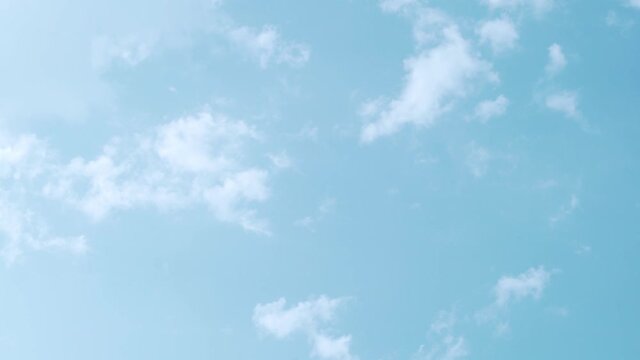 Timelapse of White Clouds in a Clear Blue Sky. Natural Background of Clear Sky and White Clouds. Atmosphere, Serene Blue Sky, Air, Altitude, Azon Layer.