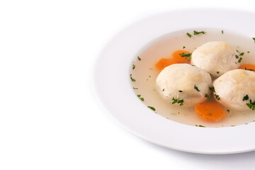 Traditional Jewish matzah ball soup isolated on white background. Copy space