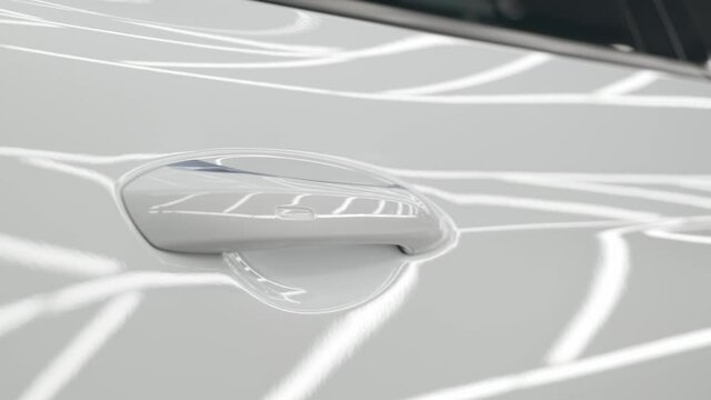 Auto detailing. Polished white business class car in the salon. Sport car. High quality 4k footage