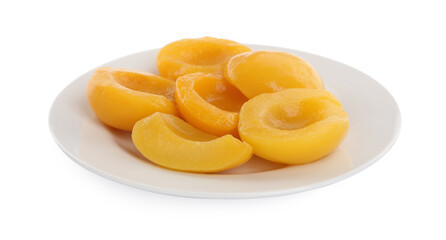 Plate with canned peach halves isolated on white