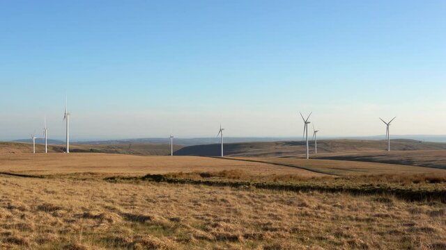Wind turbines. Wind farm in WaWind turbines. Sustainable renewable natural energy power source concept. Mynydd y Betws wind farm, Swansea, Carmarthenshire, South Wales, GB UK