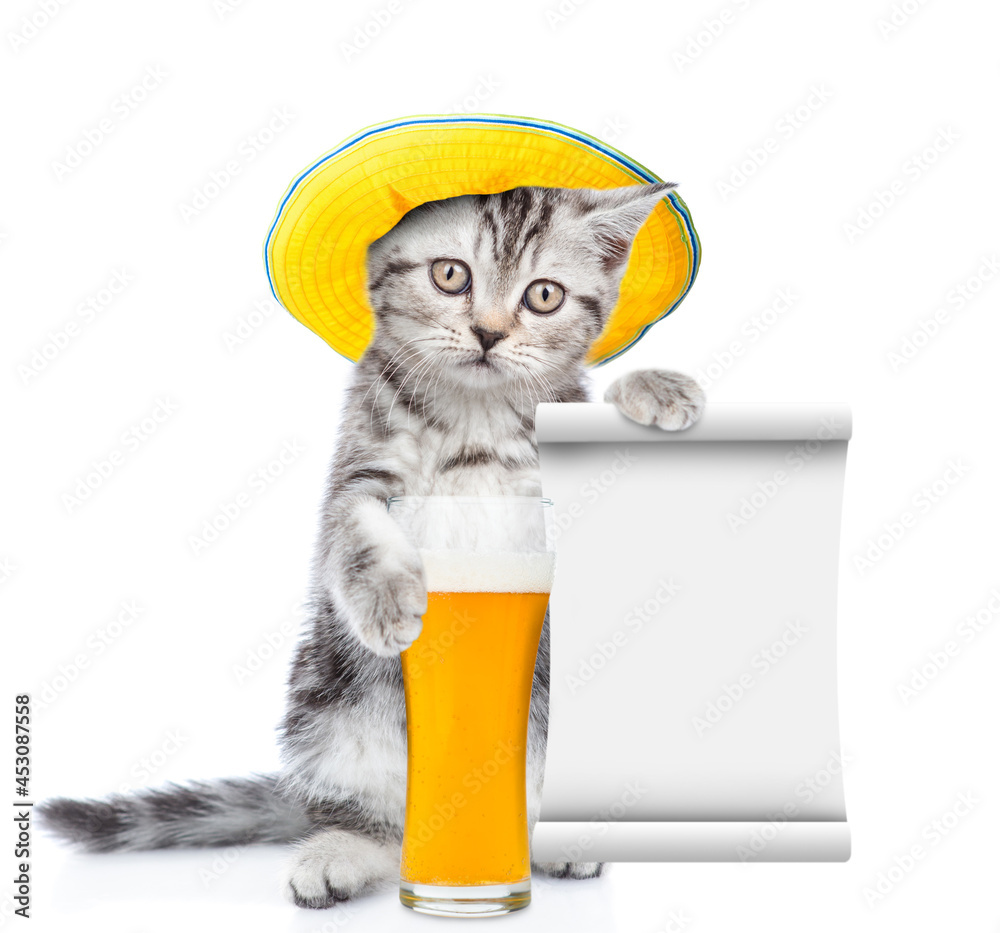 Poster Funny kitten weaing summer hat holds mug of a beer and shows empty list. isolated on white background