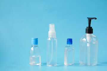 hand wash liquid in a container onblue background 