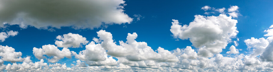 Obraz na płótnie Canvas Panorama Blue sky and white clouds.Fluffy cloud in the blue sky background.Vivid sky on white cloud.