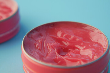 Close up of used petroleum jelly in a container 