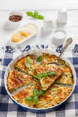Fototapeta na wymiar Scarpaccia, italian zucchini tart in a baking dish