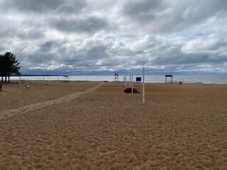 empty and abandoned sandy beach in the daytime.