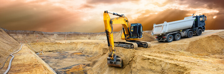 heavy excavator working at construction site