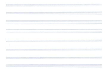 A clean music notebook. A sheet in a ruler for recording notes.