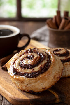 Cinnamon roll and hot coffee
