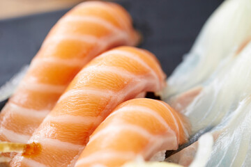 Raw salmon sushi on a plate 