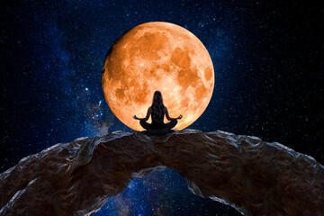 Woman meditating and observing the universe