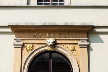 Facade of an old classic pharmacy in Krakow, Poland