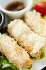 Shrimp tempura and sauce on a plate 