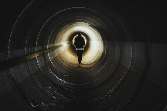 woman going through a cycling barrel