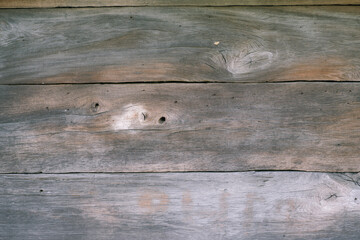 Naklejka premium Wood texture, background. The surface of an old wooden slab house. Old slab texture. Abstract wood background, empty template Old Vintage Planked