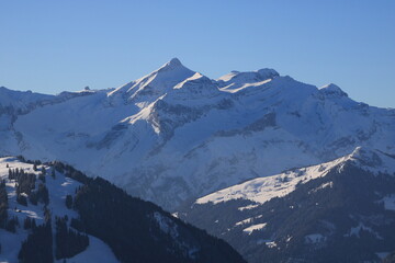Fototapeta na wymiar Mount Oldehore and Diablerets Glacier. Winter landscape near Gstaad, Switzerland.