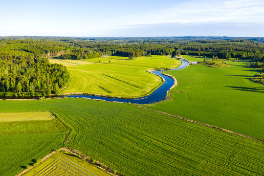 Aerial View Of Cultivated Field And Small River