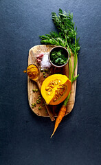 Ingredients for Curried Carrot And Pumpkin Soup. Fall recipes.Top view - 453108703