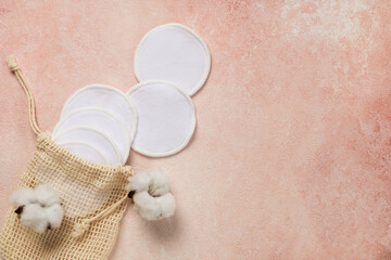 Reusable cotton pads on pink background
