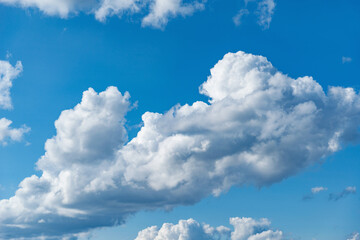 Obraz na płótnie Canvas Small clouds on the blue sky. Cloudscape at day time.