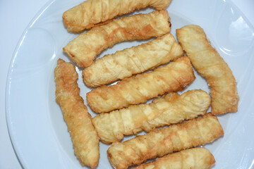 fried brioche served on white plate