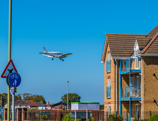 A view of an aircraft on final approach to land at Lee on Solent, UK in early summer