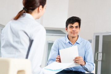Obraz premium portrait of a young man at a business meeting