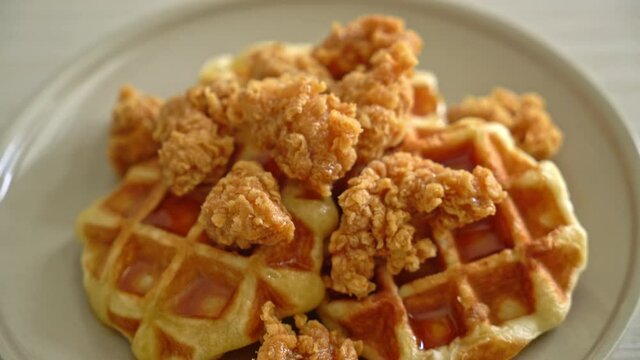 homemade fried chicken waffle with honey or maple syrup