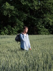 a young man in a field