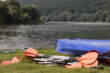 kayaks on the river bank