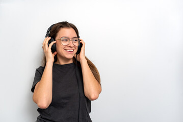 Young latin woman with headphones against white background