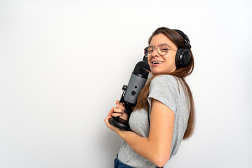 Young latin female announcer against white background