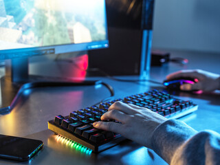 Teenage boy using keyboard and mouse