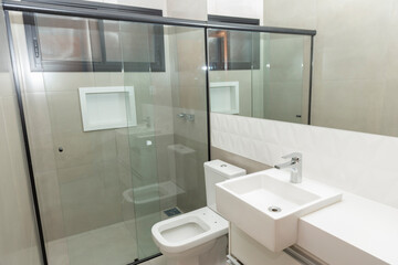 White marble sink with modern overlay basin and shiny stainless steel faucet