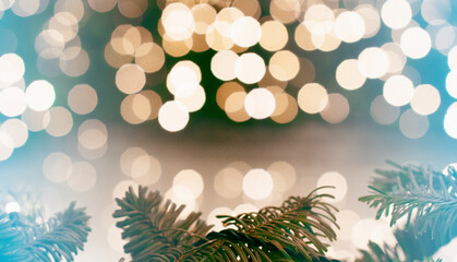 christmas background with blurred bokeh and fir branches