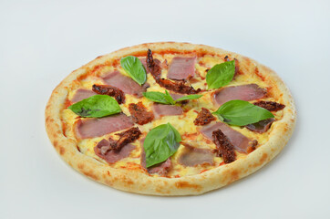 pizza with salami tomato cheese and meat. on white background