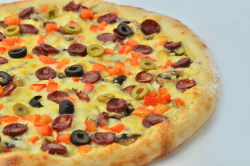 pizza with Cornish mushrooms, cheese and salami top view