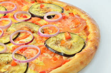 classic pizza with cheese, vegetables onion and tomato closeup view