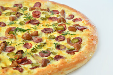 pizza with Cornish mushrooms, cheese and salami closeup view