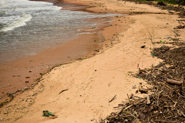 Ocean-Sea Waves Beach Sand and Garbage Background