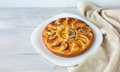 Peach pie. Homemade baking. Selective focus. Close up. Top view. Copy space