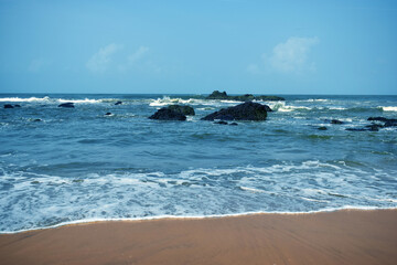 Ocean-Sea Waves, Mountains Rock Stones and Sky Blue Landscape Background